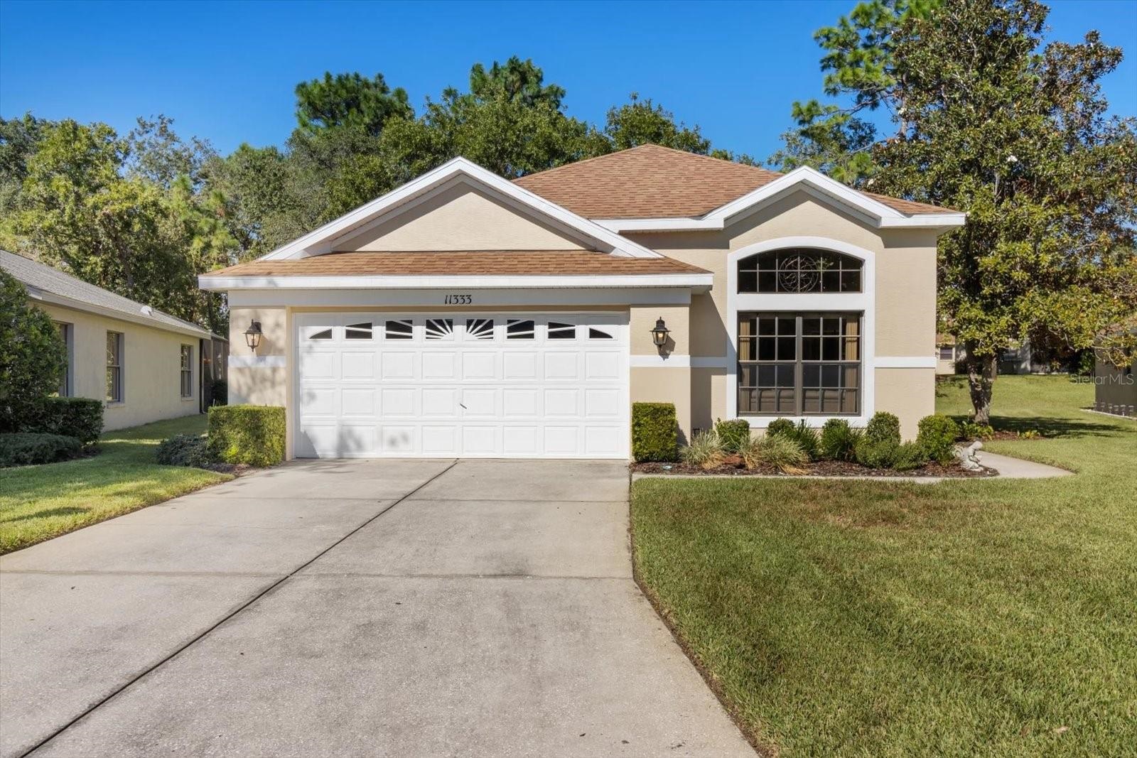 Single-family home in Wellington at Seven Hills, a 55+ community in Spring Hill FL
