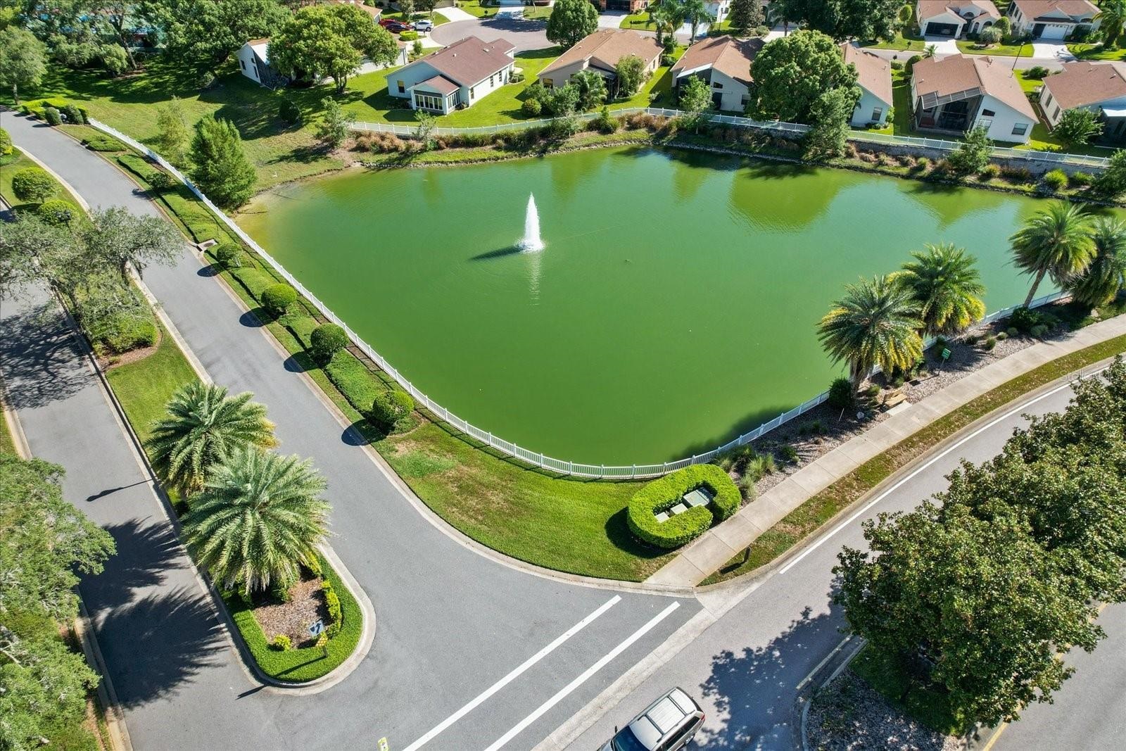 Lake with fountain and homes in Wellington at Seven Hills, Spring Hill, Florida